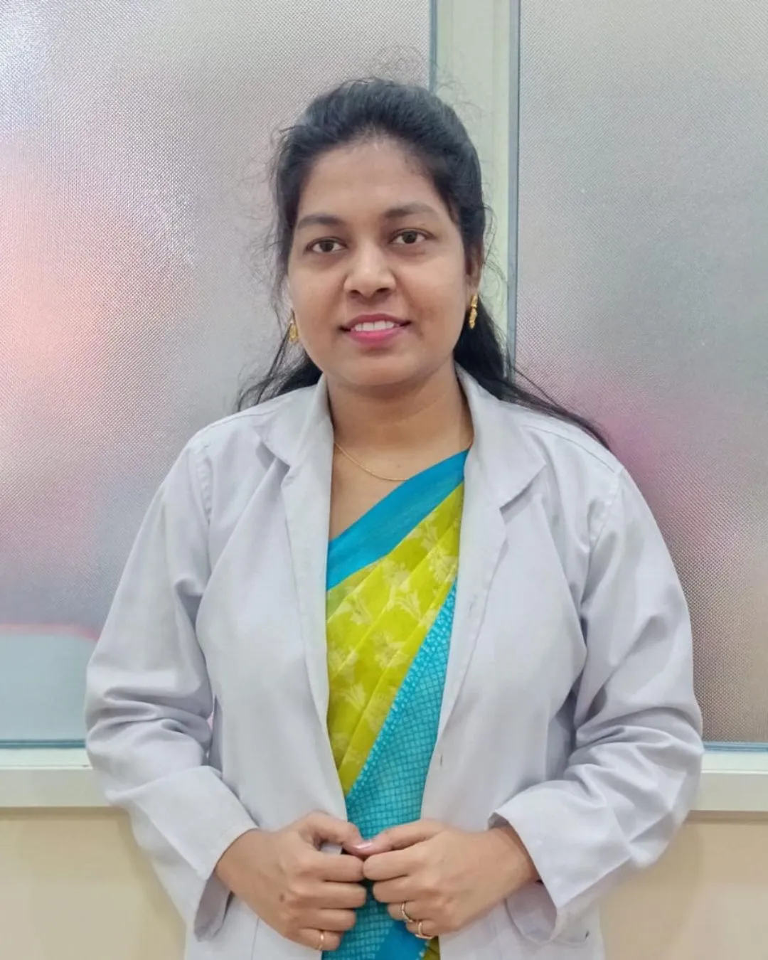Dr. NILOFAR
